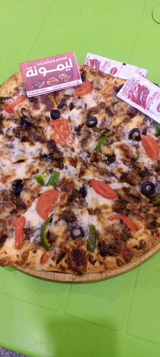 مطعم ليمونة يقدم لكم اشهة واطيب مئكولات لحم عراقي 💯💯
كيلو كباب 20شيش مع مقابلات 18000
نص كيلو كباب 10شياش مع مقابلات 9000
نفر كباب اربع شياش مع مقابلات وصمون 7000
نفر معلاك اربع شياش مع مقابلات وصمون 10000
بيدزا صغير لحم 5000
بيدزا وسط لحم 6000
بيدزا عائلة لحم 8000
لحم بعجينة صغيرا 2000
لحم بعجينة وسط 3000
لحم بعجينة عائلية 5000
ريزو لحم دبل 5000
ريزو دجاج دبل 4000
كص لحم عجل عراقي 1500
كص دجاج كفيل 1000
صاج ايطالي دبل 4000
صاج عربي 2500
همبركر لحم عجل عراقي 1500
العنوان سوق شيوخ بدايت طريق العكيكة مقابيل كوفي بمبش 
***********
توصيل مجاني تدللون
