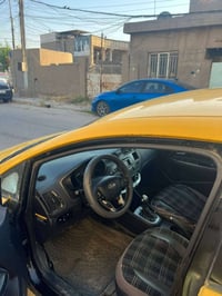 كيا ريو للبيع 2014 وارد أمريكا حادثها شبر بالجاملغ الامامي ومصلحي نفسه...