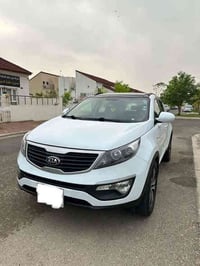 كيا سبورتج للبيع مديل ٢٠١٤ محرك دوش فول مواصفات خليجي لون ابيض ثلجي *س...