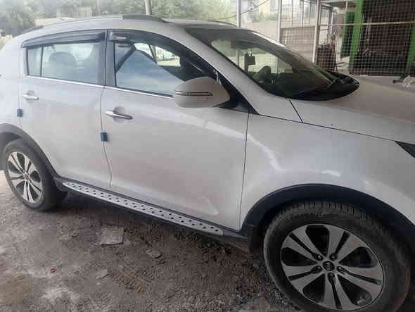 سبورتج ٢٠١١
مكفوله من (الصبغ والتبديل والرش) 
مكينه ٢٠٠٠ دوش
كشنات جلد 
كشن السايق كهرباء
٥ ويل كاب 
حساسات خلفيه
شاشه وكاميرا خلفيه
ثلاجه بالجكمجه
بانوراما 
مري شفط
تدفئه وتبريد بيانو
ماشيه ٢٧٧ قابل للزياده
هزه وسنويه ٢٠٣٠

باقي مواصفات السبورتج عدا البصمه
رقم سليمانيه صور السونار بالمنشور

ملاحظه فقط التبريد فجأه كام ميبرد وطوافه البانزين متقره فول  
مكاني بغداد
السعر ١٣٨ مع مجال قليل.... 

*********** اتصال أو واتساب
