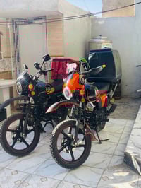 دايوان 2025لون برتقالي واسود  الدراجة نزلتها اني بعدها زيرو وكل اسبوع ...