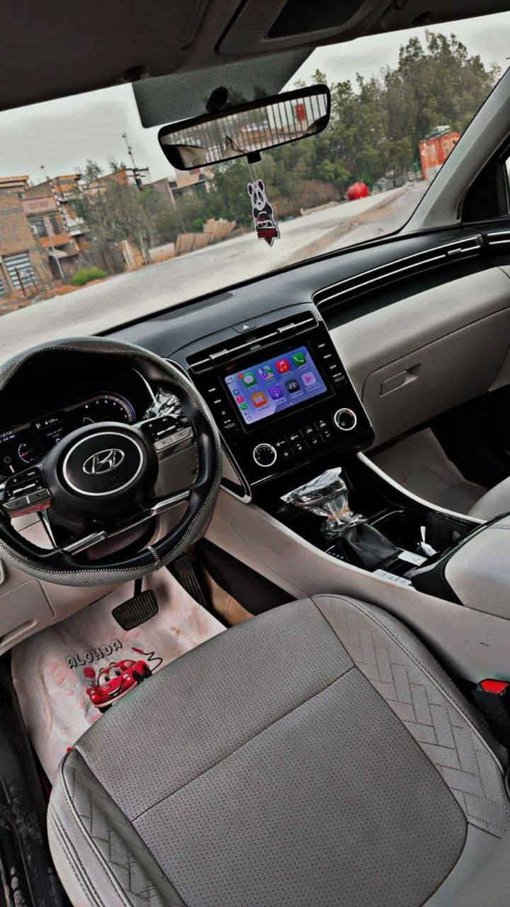 هيونداي توسان 2022 خليجي مكفوله كفاله عامه
 فول مواصفات عدى البانوراما
‏رقم بغداد بسمي هزه وفحص جديد بشهر 7 مجددهن مشروع وطني اي محافظه تداور
‏حجم المحرك 2000
‏ويل 19 رياضي
‏شاشه دجتل
‏تشغيل بصمة 
‏تشغيل عن بعد
‏AIRBAG عدد 2
‏سايد بريك دگمة   
‏بك لايت LED
‏كروس سرعه
‏اتو هولد اريل نفيكيتر
‏مقاعد امامية كهرباء 
‏بردات ابواب خلفية 
‏حساسات امامية 
‏حساسات خلفية 
‏حساس كشنات
‏تحكم مقود كامل
‏بصمات عدد 2 
‏انارة ترحيب
‏مدوشمه جلد كشنات وارضيه
‏نقطة نزول منحدرات
‏نظام مانع تزحلق  ‏ABS
‏شاحن موبايل واير ليس  
‏اشاير بالمري والمري قابلة للطي 
‏مخرج AUX
‏مخرج USB
‏BIuetooth
‏مخرج منفذ الطاقة عدد 2    
‏درايف مود
‏(Normail - eco- sport t) 
‏كفاله عامه من جميع النواحي السعر 213 بيه مجال بسيط 
‏الاستفسار اكثر *********** مكاني ديوانيه
