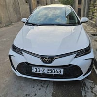 كورلا موديل ٢٠٢٤ بأسمي مكفولة  نظيفة داخل وخارج مغلفة ارضية وكشنات ماش...