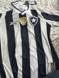 قطعة • ملابس