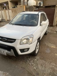 سلام وعليكم سبورتج 2010كوري فول مواصفات  سيارة مكينة ٢٠٠٠ دوش مكينة كي...