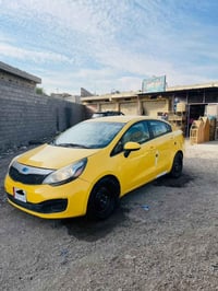 كيا ريو ٢٠١٤ وارد امريكي بغداد حي المواصلات السعر ٦٩ 07705569600