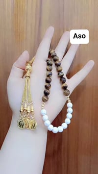 مسبحة من حجر التايكر(عين الهر) والعطف البري 33 حبة حجر طبيعي ضمان الفح...