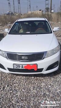 كيا اوبتيما للبيع 2010 السعر127 وبيه مجال 07842833411