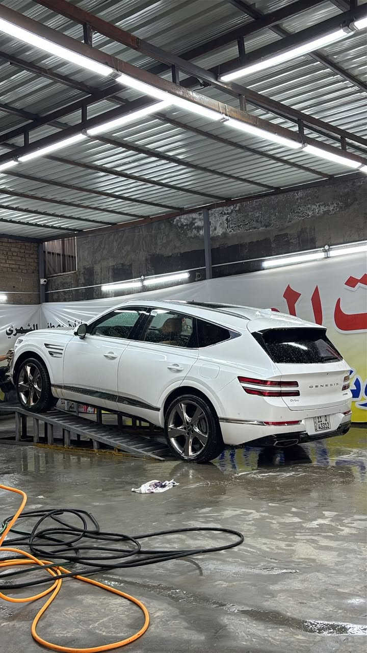 جينيسيس GV80 موديل2023–برستيج
أعلى مواصفات : 6 سلندر 3.5 لتر تون تيربو
 ناقل الحركة: أوتوماتيكي 8 سرعات
 نظام الدفع: AWD

 الحالة:
حادثها جاملغ مبدل نفس اللون والدعاميه نفس اللون صبغ فقط بنيد •
 (صور الحادث داخل المنشور)
• ماشيـة 31 آلاف فقط
•  رقم بغداد – باسمي
• شاشة وعدادات باللغة العربية 

 عدد المقاعد: 5 كهربائية + خزن+ مساج للسائق
• أبواب شفط + سقف بانورامي مع بردات كهربائية + سقف كنتاره
• كاميرات 360 درجة + 7 رادارات حولية
• عداد 3D دجتل + بوصله + خرائط 
بصمتين ريموت تتقدم وترجع
• تدفئة وتبريد 5 مقاعد + تدفئة المقود +
• إنارة محيطية 64 لون
• قيادة ذاتية جزئية + تحكم كامل بالمقود
• جنوط 22 إنش
• نضام مكالمه سائق مع الراكب من خلال سبيكرات
• نظام الصوت 21 سماعة Lexicon 
• داتشو + شحن لاسلكي
• مقاعد جلد نابا فاخرة
• صندوق خلفي كهربائي + فتح ذكي
• نظام تعليق إلكتروني ذكي (ECS)
• دفع رباعي مع تحكم بأنماط القيادة (Eco – Comfort – Sport – Snow – Custom)
• عزم قوي وتسارع من 0 إلى 100 كم/س بحدود 4.3 ثواني
• سحب حتى 2700 كغم
وبعد بيه كلش هوايه موصفات متخلص لان فئه رويال برستيج vip
مكاني بغداد الغزالية 
 ***********
