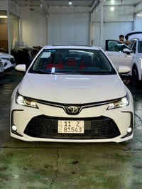 كورلا 2025 رقم بغداد   السيارة مكفولة كفالة عامة  من البارد والصبغ وال...