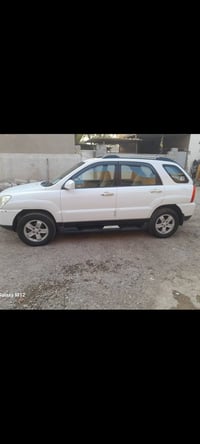 كيا سبورتج موديل 2009 خليجي مكينه2000 بيهه بارد كد شبر بالجاملغ الأمام...