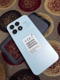 بوكو F8 برو • بطارية 100% • ملحقات كاملة