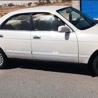 البصرة • سيارة • رقم بالوصف