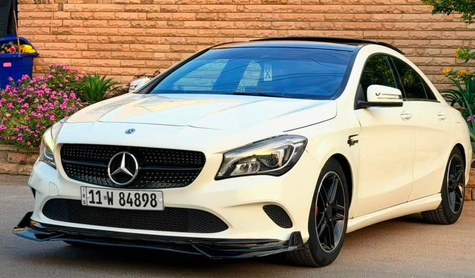 السلام عليكم 
🚘 للبيع أو المراوس: مرسيدس CLA 250 4MATIC  2018🚘 
250 فورمتك  بأعلى مواصفات وفول إضافات. 
تفاصيل الضرر والبودي:
 * الضرر: موضح بالصور 
 * الصبغ: 3 قطع أمامية (تجميلي).
 * الدواخل: سليمة تماماً (اللغود والشاصي 
  (فول مواصفات):
 * السقف: بانوراما.
 * الشاشة والتحكم: شاشة كبيرة، ماوس لمس، تحكم ستيرن جهتين، شفتات ستيرن.
 * الأنظمة المساعدة: رادارات بالمري، نظام تصحيح المسار، أنظمة قيادة متعددة، اوتو هولد.
 * البصمة والأبواب: بصمة تشغيل و4 أبواب بصمة، يدات ترحيبية، إشارات ترحيب.
 * المرايا: مرايا كهربائية مع إشارات جانبية.
 * المقاعد (الكشنات): كشنات كهرباء، خزن ميموري، تدفئة، إضاءة LED داخلية.
 * الأمان: نظام فرامل 4 ديسك.
 * الصوت: سستم صوت 
الاضافات والجمالية:
 * كيت AMG كامل (مازدات 4 عدسات، ويل AMG مختم).
 * تخم تاير جديد.
 * إضافات خارجية مميزة: (لحية، دوسات، سبايدر 
 * المحرك والـكير: بحالة الوكالة (جديدات وبدون أي نقص).
الصدر والحدادية 100%
 إدامة كاملة، والترايك وين ما يعجبك
الممشى 81 الف mil حقيقي.
 * الرقم: بغداد باسمي شخصياً، هزة وفحص جديد وجاهزة للتحويل.
السعر 153 ورقة 
📍 العنوان: بغداد بسمايه 
📞 للاستفسار والتواصل: *********** بغداد, العراق
