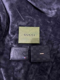 محافظ رجالية • جلد طبيعي • ماركات