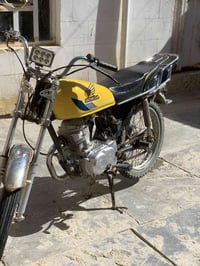 نامة كلك كلك • دراجة نارية • مجال بسيط