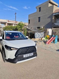 ، كورلا كروس 2024 تجميع الصين، محرك 2000 + هايبرد ، كشن احمر جلد ، فتح...