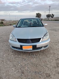 لانسر ٢٠١١ • رقم بغداد • بدون حادث