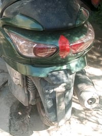 أبيع دراجة نارية مستعملة، خضراء اللون. الدراجة بحالة جيدة وتعمل بشكل م...