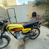 دراجة • مكينة ما مفتوحة • البصرة الهارثة