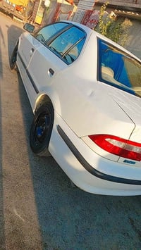 سمند ١١بغداد ابيض رقم انكليزي بأسمي تخم تاير حداديه امامي خلفي جديد كي...