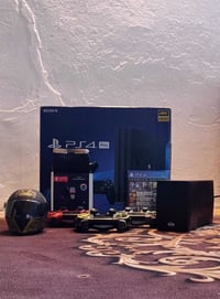 متوفر جهازps4 برو نضيف ومستخدم قليل شرط الفحص وضمان أسبوع  ملحقاته يدا...