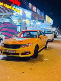 اوبتيما • ٢٠٠٩ • مكينة ٢٠٠٠