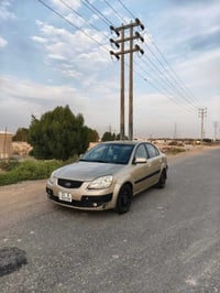 كيا ريو • ٢٠٠٩ • رقم بغداد ١١