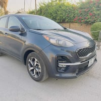 سبورتج 2021 وارد امريكي  رقم بغداد بسمي  مواصفات عادية  سياره ماشية ٣٠...