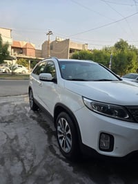 سورنتو ٢٠١٥ • ٧ راكب • مكفولة من الصبغ