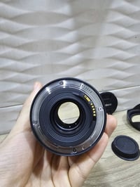 عدسة كانون 16-35 الإصدار الثاني نظافة 100% مجرد خدوش خارجية وياها القب...