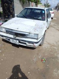 لانسر ١٩٩١ • محرك بروتون • رقم دولي