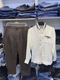 قميص L • بنطلون 34 • حرية شارع مختار