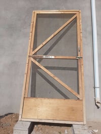 باب خشب مغلف • ١م×٢٫٢٠م • شهربان