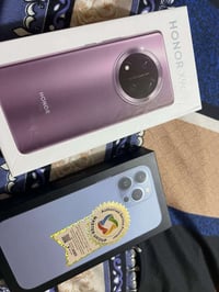 آيفون ١٣ برو ماكس • هونر اكس ٩سي • كارتون