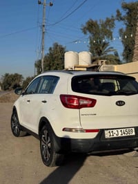 سبورتج موديل 2012خليجي   ما بيها اي نقص مال جناي تخم تاير جديد  رقم بغ...