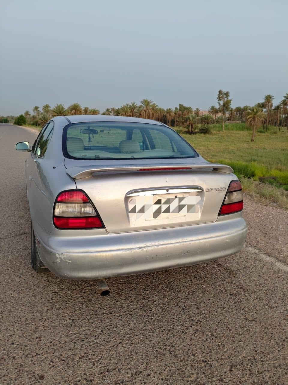 السلام عليكم.. دايو لكنزا موديل 2001 رقم بغداد انكليزي بأسمي السيارة كير اوتوماتيك.محرك مسكر الكهربائيات كلها شغاله جام كهربائي تبريد شغال خير من الله  مصبوغة عام  رايدها 45 مكاني بابل الشراي يتصل على الرقم***********
