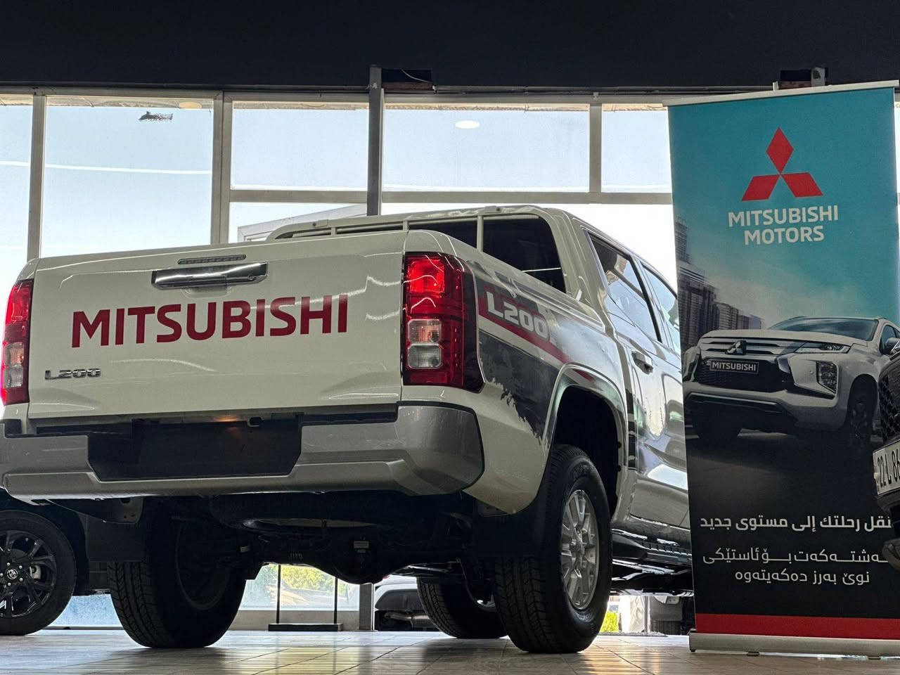 *نويكار اوتو لتجارة السيارات في اربيل*
 ميتسوبيشي L200  بانزين فول موصفات 
━━━━━━━━━━━━━━━━
 المواصفات الفنية:
• محرك 2400 CC 
• نظام دفع رباعي 4x4
• نظام إضاءة ذكي + كشافات زينون عالية الوضوح
• مثبت سرعة
- العداد 0 km 
- ضمان شركة 
- شاشة عريض 
- كير عادي
- مرايا إشارة 
- مرايا كهربائي 
- تبريد مركزي 
- مانع انزلاق 
- دفع رباعي H2. H4. L4 
- للمعلومات زياره موقعنا :

 اربيل / شارع 100 المعارض / تقاطع مخمور / قرب معمل بيبسي 

- او الاتصال بالقسم بالمعبيات ☎️
***********  آسيا 
*********** آسيا 
***********  آسيا 
*********** كورك
