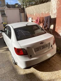 كيا ريو للبيع موديل 2012 جاملغ امامي يمين صبغ بدون دواخل  وبدون بارد س...