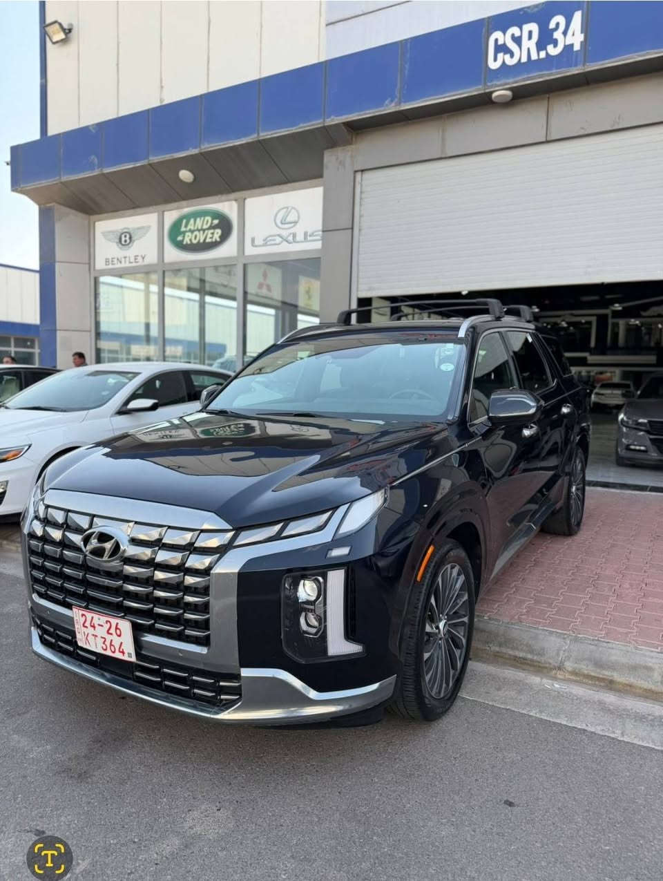 سيارة هيونداي باليسيد كاليجرافي 2024 (Hyundai Palisade Calligraphy) باللون النيلي على سواد
وارد امريكي دخول جديد
-كير ومحرك مكفول
- السعر 31000 دولار وبي مجال  
- ⁠السيارة رقم اربيل 
- ⁠الحادث امامي البنيد مصبوغ نص فقط والدعامية مبدله
- باقي السياره كفاله عامه 
- السونار مرفق مع رقم الشاصي
-نوع المحرك: تنفس طبيعي 6 أسطوانات (V6) بسعة 3.8 لتر (GDi).
الممشى: 35000 mile 
-ناقل الحركة: أوتوماتيكي من 8 سرعات (تحكم بالأزرار Shift-by-Wire) مع شيفرات تبديل (شفتات).
-نظام الدفع: دفع كلي ذكي HTRAC AWD مع أوضاع قيادة متعددة (Comfort, Eco, Sport, Smart) بالإضافة إلى أوضاع التضاريس (Snow, Mud, Sand).
-مصابيح أمامية وخلفية LED كاملة بتصميم عمودي، مع إضاءة ترحيبية (Puddle Lamps) بشعار كاليجرافي تحت المرايا الجانبية.
- الإطارات مقاس 20
- فتحة سقف مزدوجة (فتحة أمامية متحركة + سقف بانورامي خلفي ثابت).
- الباب الخلفي: كهربائي ذكي يفتح تلقائياً عند الاقتراب (Smart Power Tailgate)
- مقعد السائق (Ergo-Motion): مقعد صحي ذكي يحتوي على مساج لتقليل التعب في السفر الطويل، مع ذاكرة لحفظ الوضعيات .
- المقاعد: مكسوة بجلد نابا (Nappa Leather) الطبيعي الفاخر بتطريزات ألماسية.
- جميع المقاعد تدفئة وتبريد
- السقف كنتارا
- الشاشات: شاشتان مدمجتان مقاس 12.3 بوصة؛ واحدة للعدادات الرقمية بالكامل مع عرض زوايا الرؤية العمياء عند الإشارة، والأخرى شاشة ترفيه وسطية تدعم نظام الملاحة، وأبل كاربلاي، وأندرويد أوتو.
- مرآة الرؤية الخلفية الرقمية: مرآة داخلية ذكية تتحول إلى شاشة تعرض كاميرا خلفية حية، مفيدة جداً إذا كانت الحقيبة ممتلئة بالأمتعة وتحجب الرؤية.
- النظام الصوتي من Harman Kardon
- ميزات إضافية: شاحن لاسلكي سريع للهواتف، نظام التحدث مع ركاب الصف الثالث عبر الميكروفون (Passenger Talk)، ونظام كتم الصوت في الخلف (Quiet Mode).
-  كاميرات محيطية 360 درجة 
- الرادار التكيفي ومثبت السرعة الذكي (Smart Cruise Control) مع ميزة التوقف والانطلاق
- نظام المساعدة على تجنب الاصطدام الأمامي في التقاطعات (FCA-Junction).
- نظام الحفاظ على المسار والتحذير من الخروج منه مع التدخل التلقائي.
- نظام المساعدة على تجنب الاصطدام في البقعة العمياء (BCA) والتحذير من حركة المرور الخلفية
موقع السياره 
بغداد الدوره 
للتواصل مباشر واتس
***********
