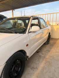 بروتون • ٢٠٠٢ • رقم بغداد دولي