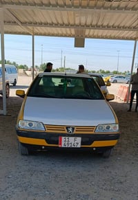 بيجو GLX 405 موديل ٢٠١٢ رقم بغداد مشروع وطني... رقم انكليزي بكل مكان ت...