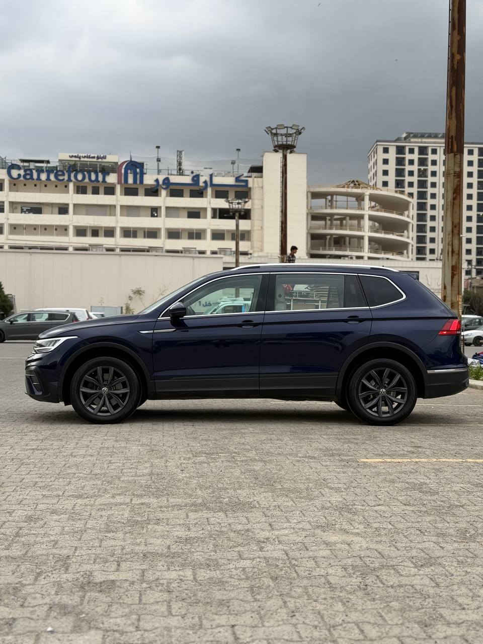 Volkswagen Tiguan SE 2023 -4MOTION
فولكسفاغن تيكوان دبل إكسل 

موديل :2023
الصنف :SE
سعة المحرك :  4 سلندر 2.00cc turbo 
الوارد :  أمريكي 
رقم الشاصي: 
اللون الخارجي : نيلي 
اللون الداخلي : كريمي 
قراءة العداد : 29300 الف مايل
الرقم : أربيل 

المواصفات 
- دبل اكسل
- كيج إلكترونية 
- شاشه كبيره
-رادار أمامي  خلفي وتحديد مسار وقياده ذاتيه 
-رادارات المراية 
-وايرلس جارج 
-بصمه وتشغيل عن بعد 
- مقاعد مدفئه
-  تبريد خلفي وامامي( 8 مخارج للتبريد) 
- نظام carplay  Android Auto 
-  شاشة وسطية
-  نظام النقطة العمياء 
-  هاند بريك بصمة + اوتوو ستارت 
- نظام توقف تلقائي عند الرجوع
 -  كاميرة خلفية بدقة عالية 
 -  نوع المقاعد: كهربائي - جلد - تدفئة 
 -  أكياس هوائية: 10 
-  المصابيح:  زينون - إضاءة ليد- ليزر

الملاحظة:السيارة بدون صبغ بدون تعديل بدون داخل فقط دعامية امامية صبغ  ارباك بردة وسترين سستم 
رقم التلفون ***********-***********
