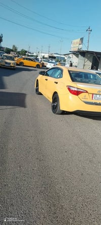 كورلا 2015 وارد كندي ضرر قطعتين بدون دواخل رقم جديد سنوية بأسمي دفتر ب...