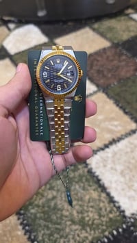 ساعة رولكس • لاند دويلر • مزاد