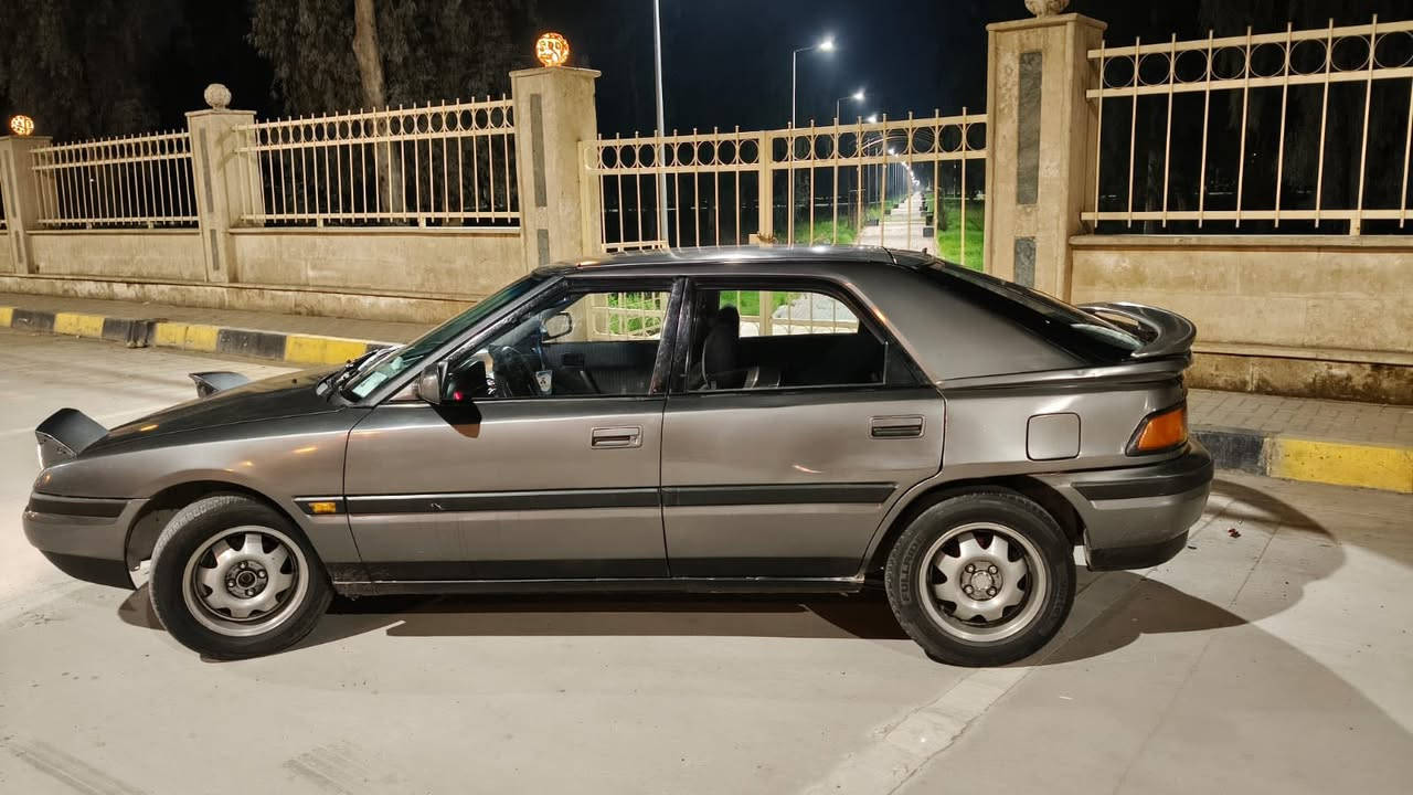 مازدا 323 موديل 1991 مصبوغه عام جماليه رقم الماني باسمي سنويه 27 للتواصل 0770 182 9567

