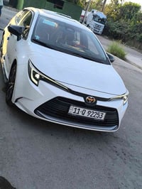 كورلا هايبرد موديل 25ماشيه اصل 14فول مواصفات مكان ديوانيه السياره اخت ...