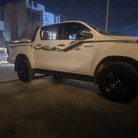 لبيع فورويل 2024 ماشيه 58 الف كويتي رقم بغداد مكفوله السعر 340وبيها مج...