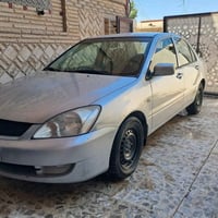 لانسر ٢٠١٠ • رقم ديالى • صبغ ٣قطع