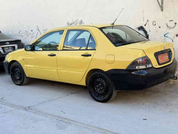 لانسةر 2010مةكينة 20قرش گير عادي كيرو مةكينة بةشةرت لايت ليدة زةربةي نية سةنةوي كارتوني
سةيارةي مةعرةز نية هي مالة 47گلاو مةعا مةلة ..*********** كالار
